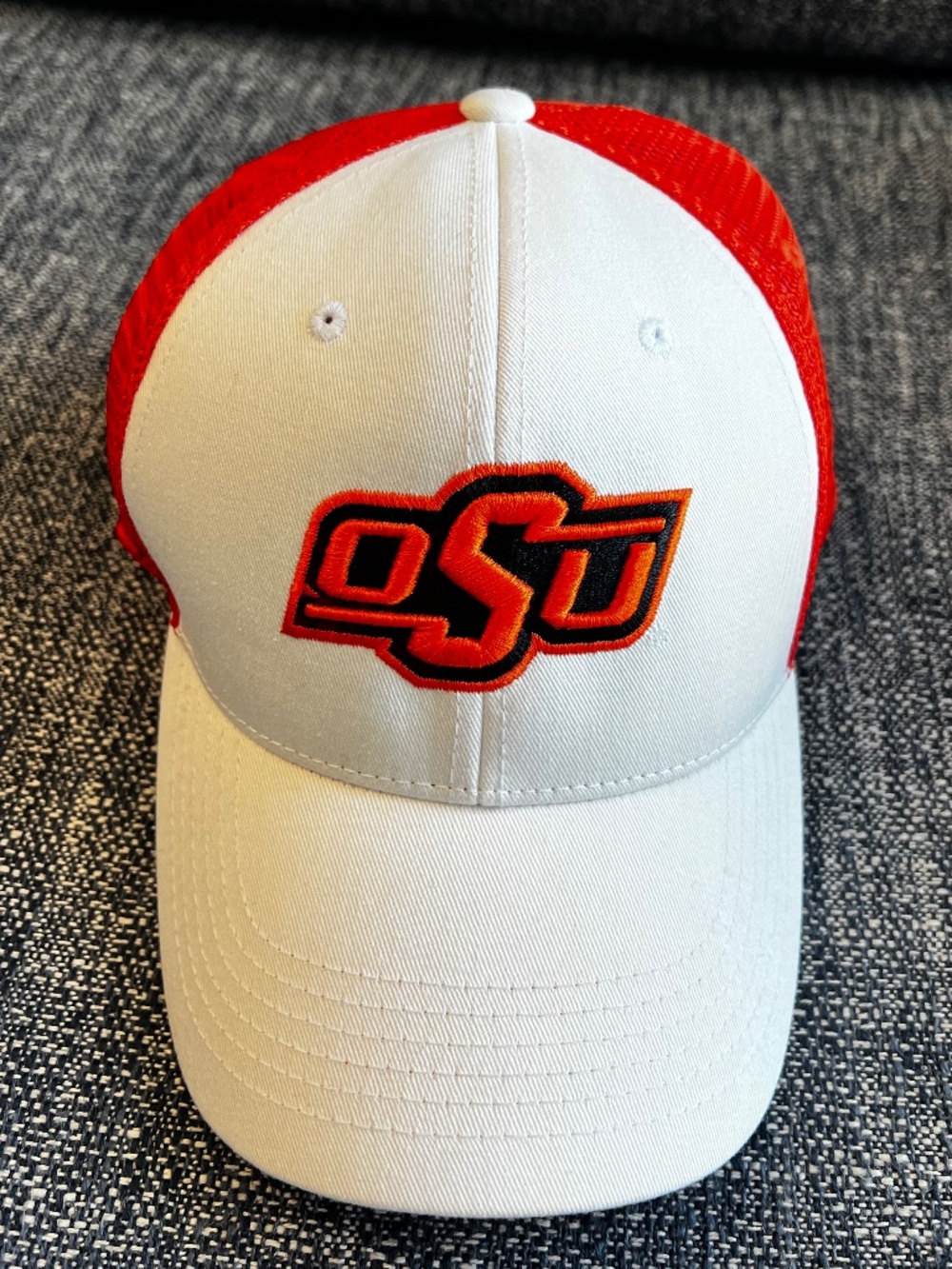 Top of the World cream and orange baseball hat with OSU (Okla State) embroidery